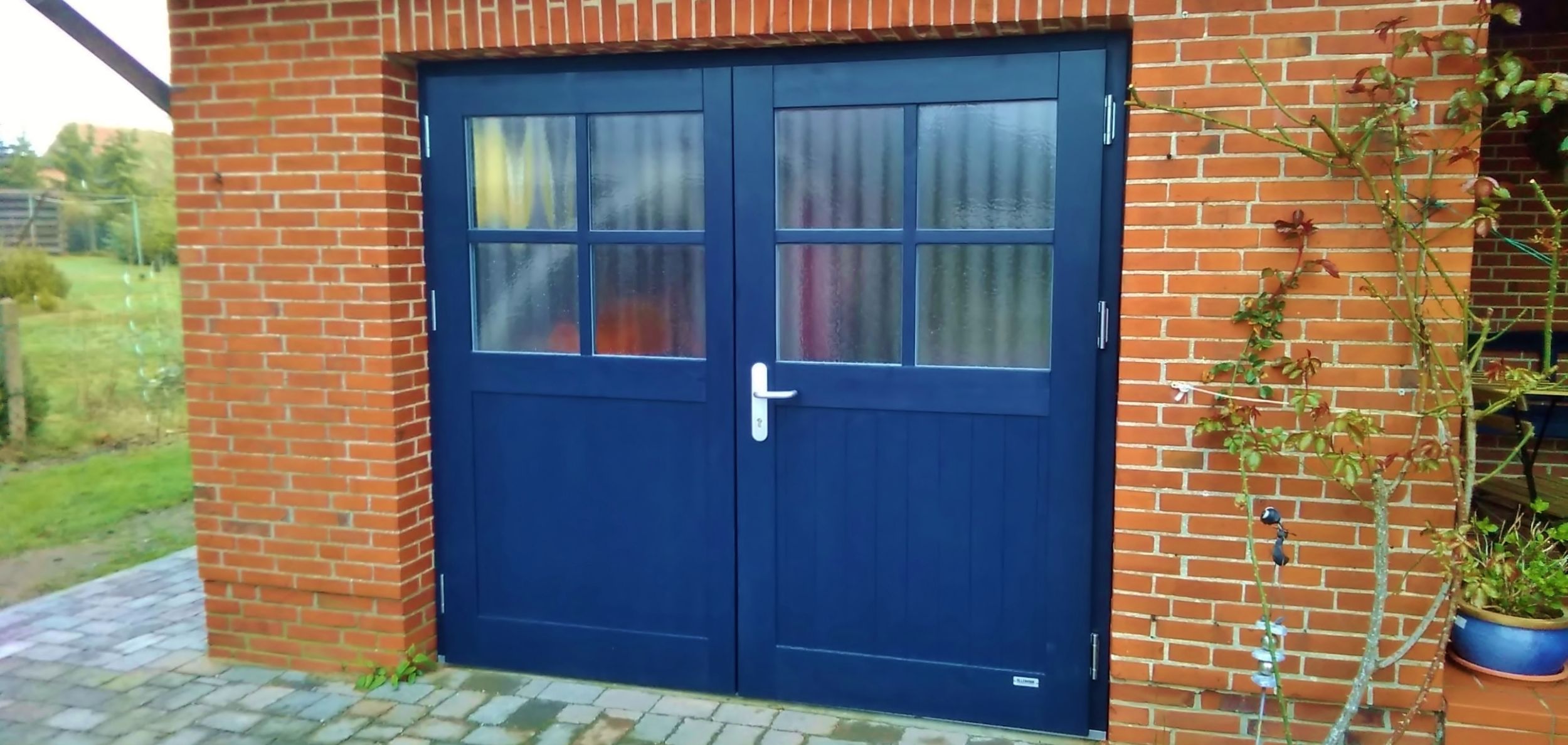 Garagentore - Flügeltore - ALLEMANN® GmbH Holz- u. Metallprodukte